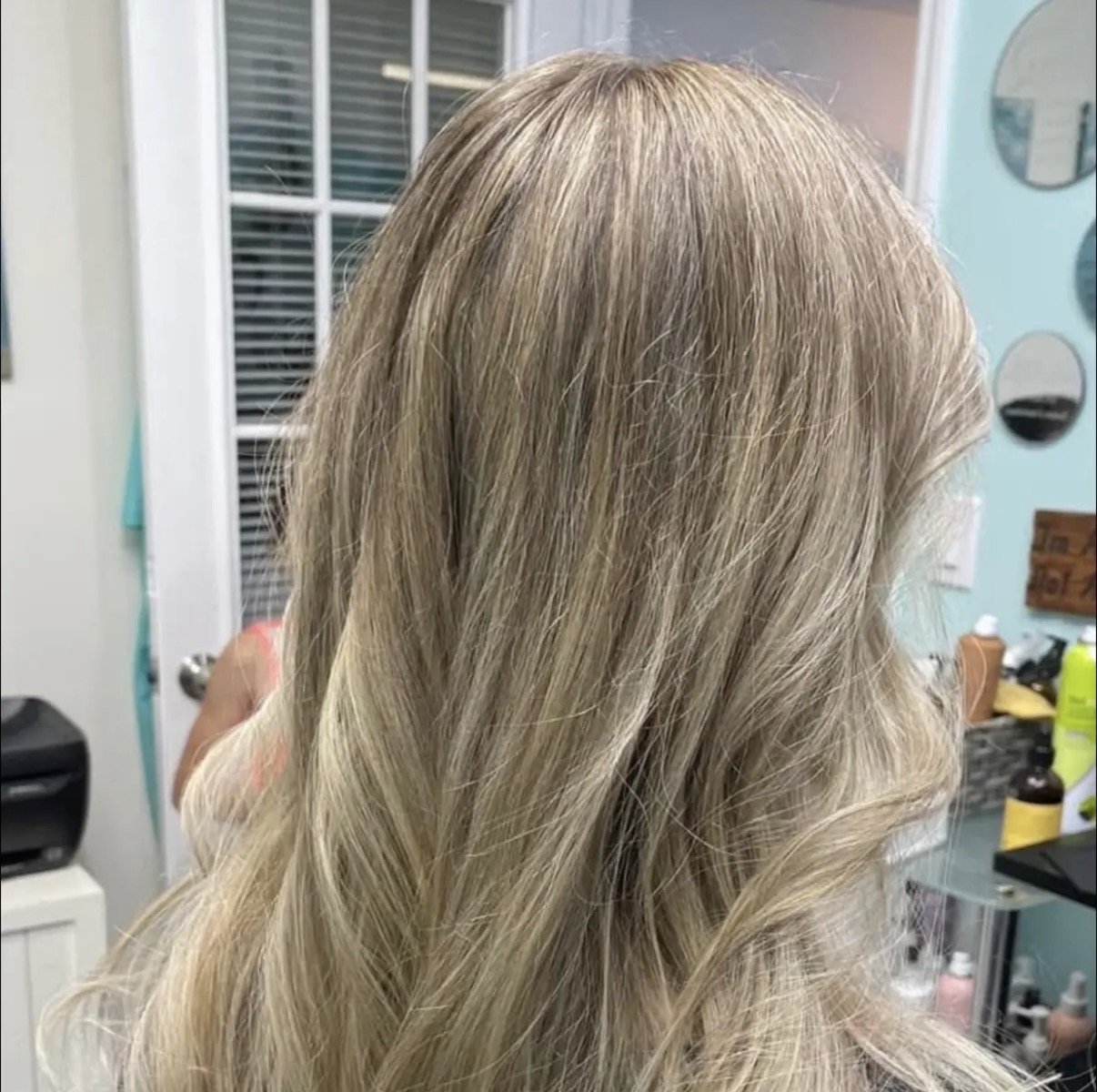 Blonde highlights styled in soft waves